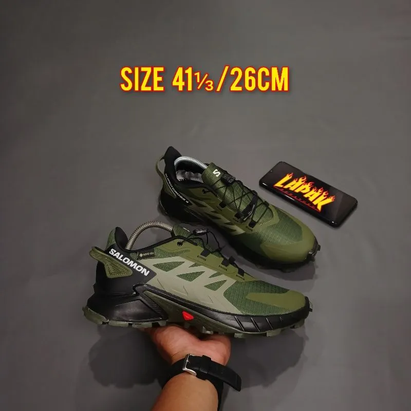 Salomon Sportswear Sneakers Pria green black photo 1