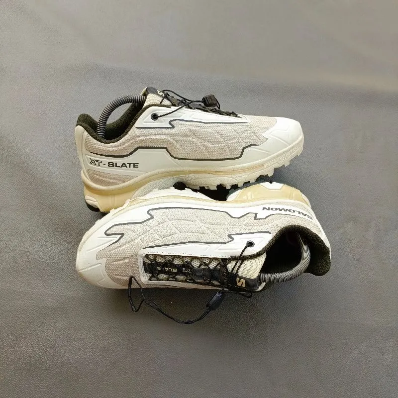 Salomon Sportswear Sneakers Pria white black photo 1