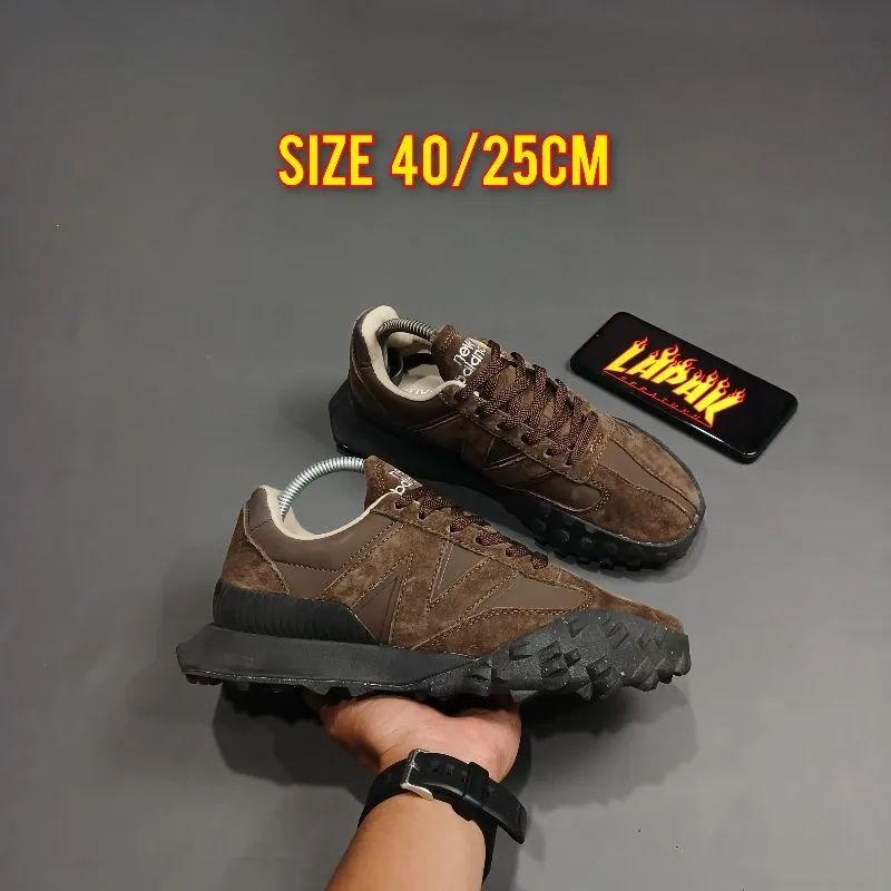 New Balance Sportswear Sneakers Pria brown black photo 1
