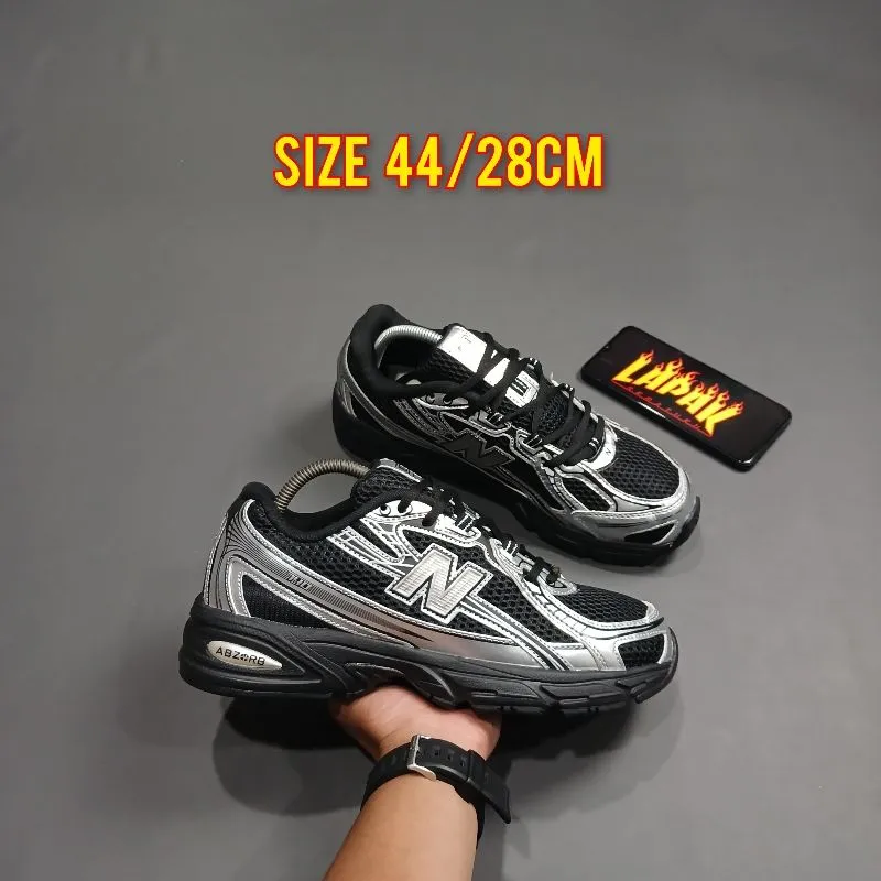 New Balance Sportswear Sneakers Pria silver black photo 1