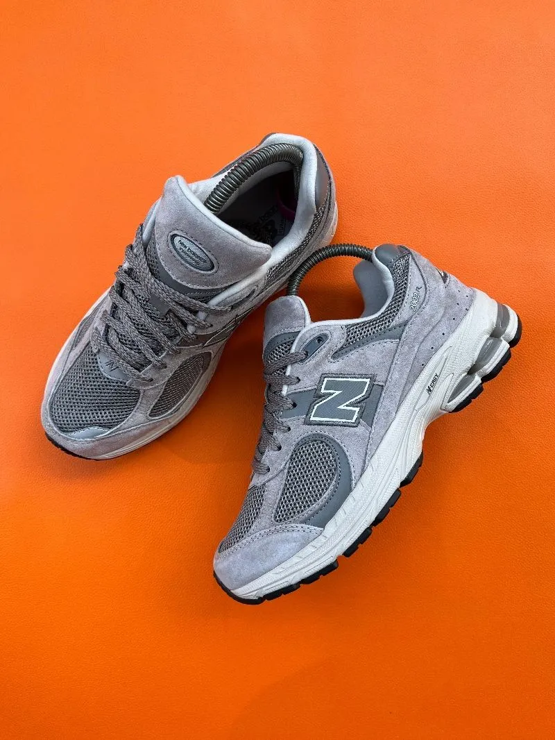 New Balance Streetwear Sneakers Wanita gray photo 1
