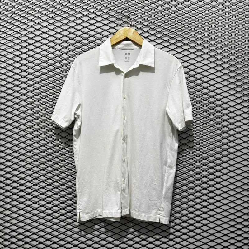 kaos kerah lengan pendek pria uniqlo second original photo 1