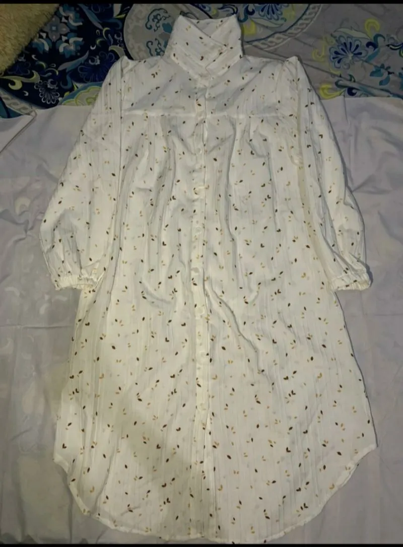 Tunik kancing ikat motif bunga  photo 1