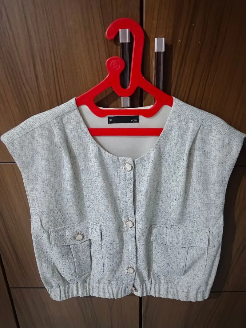 Sleeveless Button Down photo 1