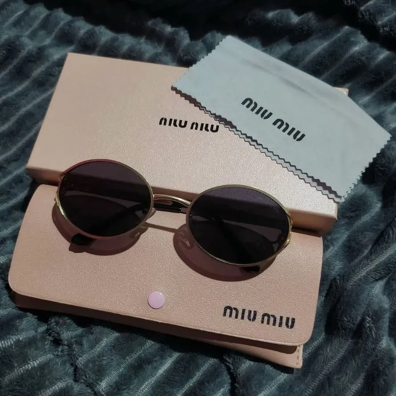 kacamata miu-miu photo 1