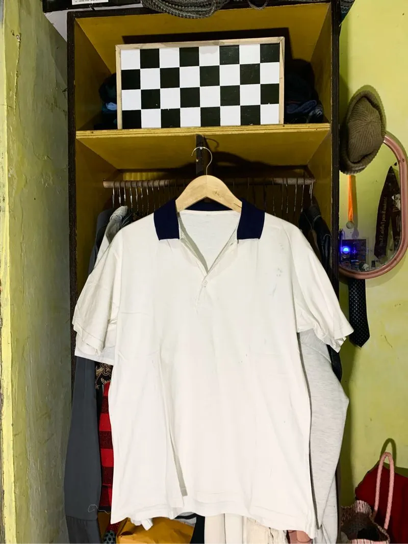 polo shirt putih photo 1