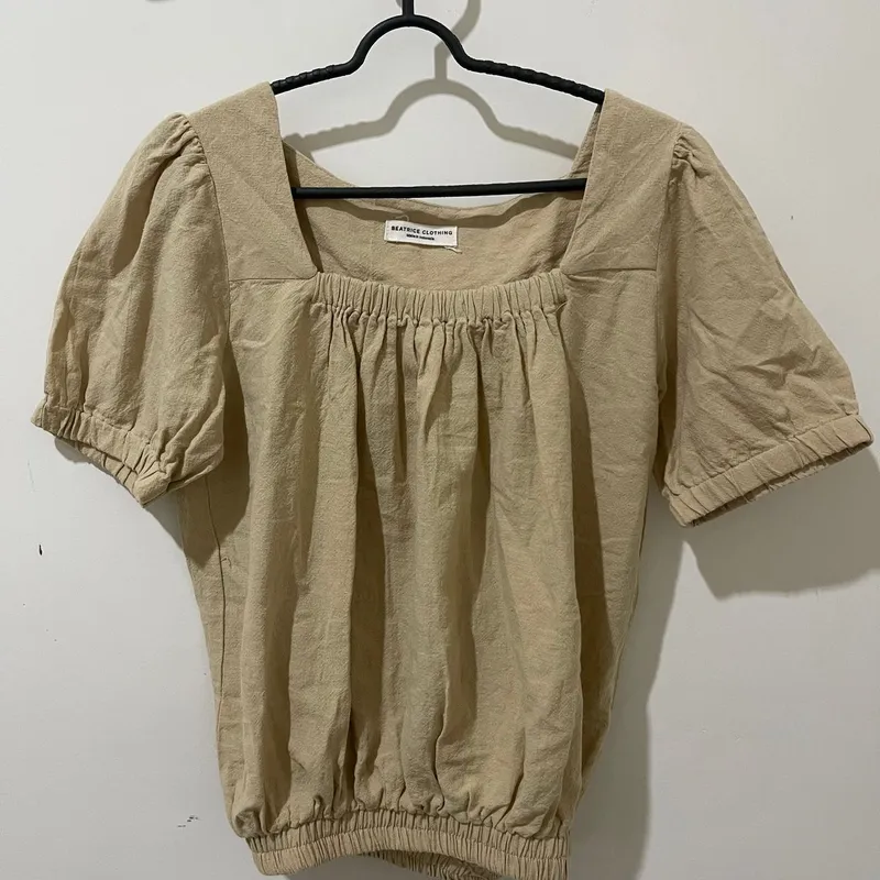 Beatrice Clothing Coquette Minimalist Blouse Wanita tan cream photo 1