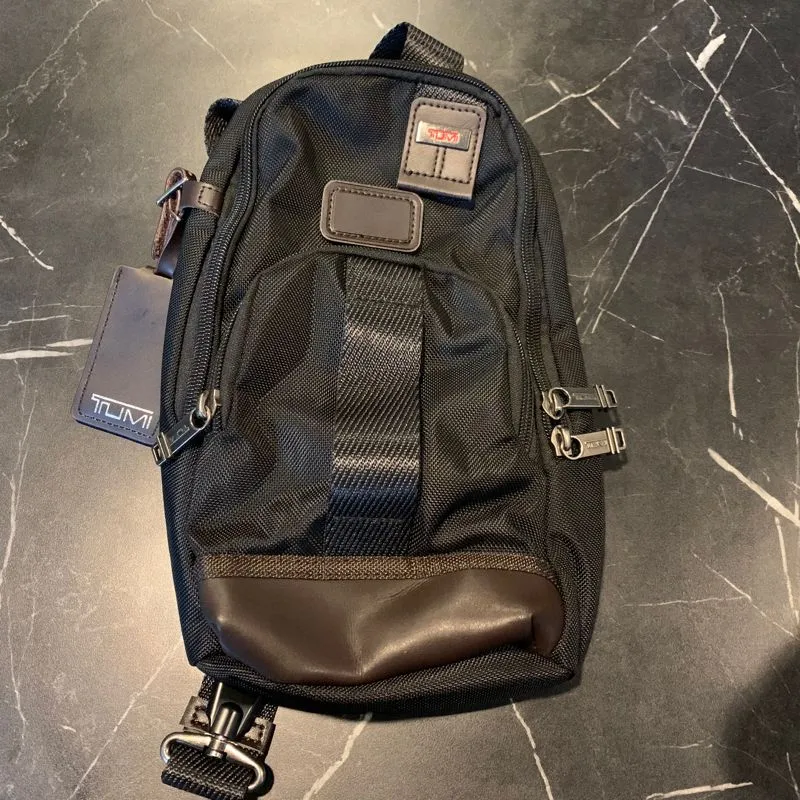 tas TUMI photo 1