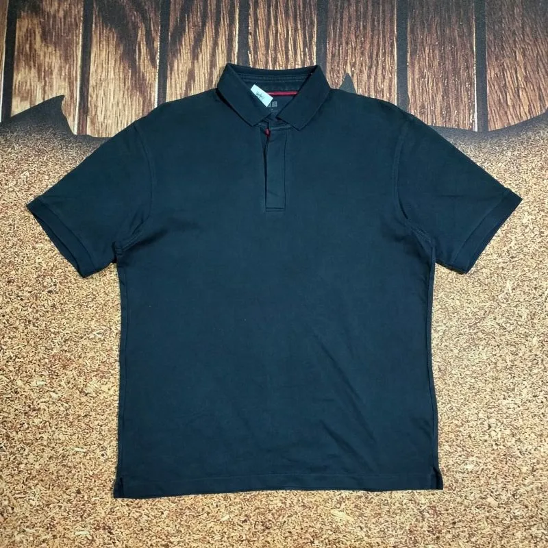 kaos polo pria navy polo UNIQLO kaos kerah casual murah photo 1