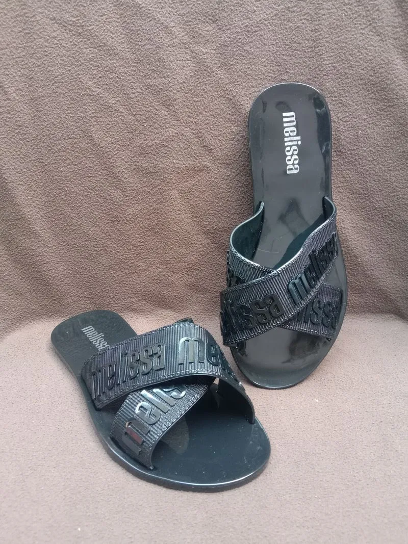 Minimalist Sandals & slide Wanita black photo 1