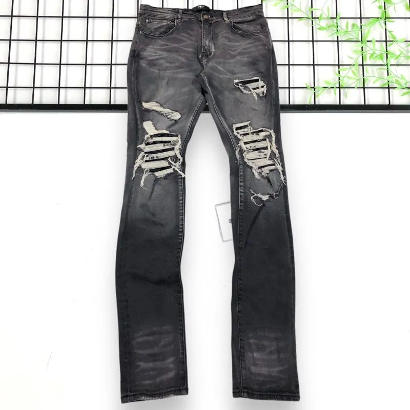 Amiri Skinny Jeans Ripped photo 1