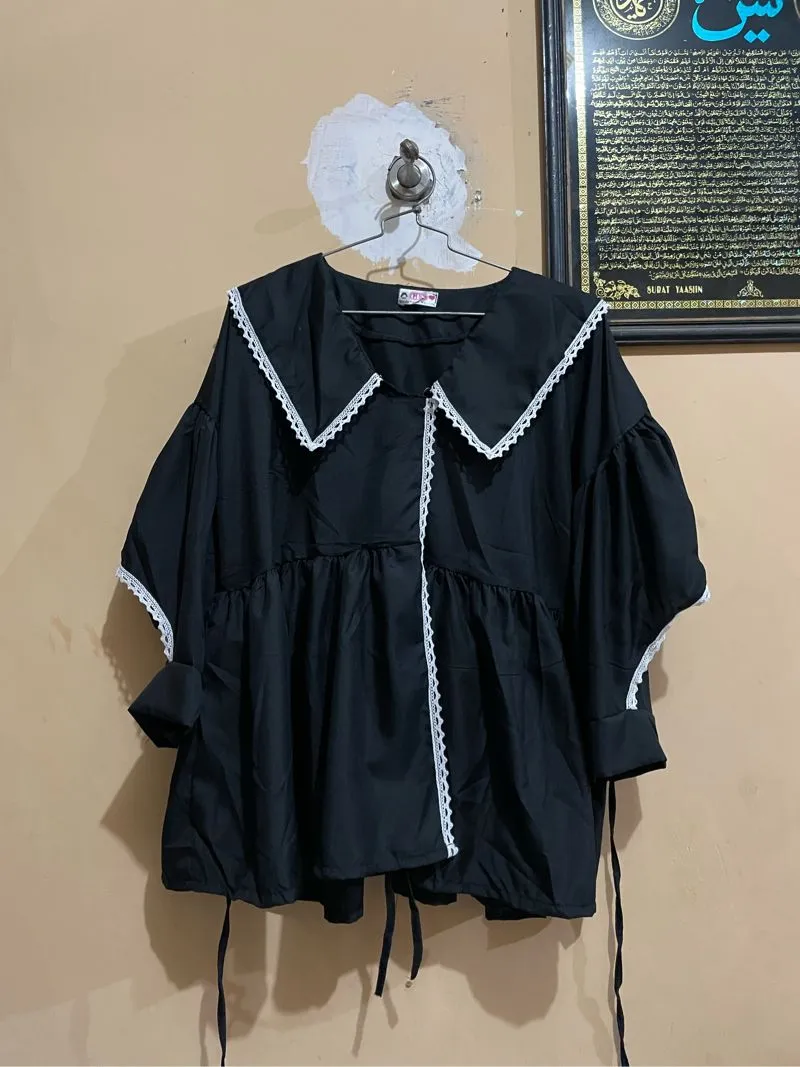 Blouse oversize polos photo 1