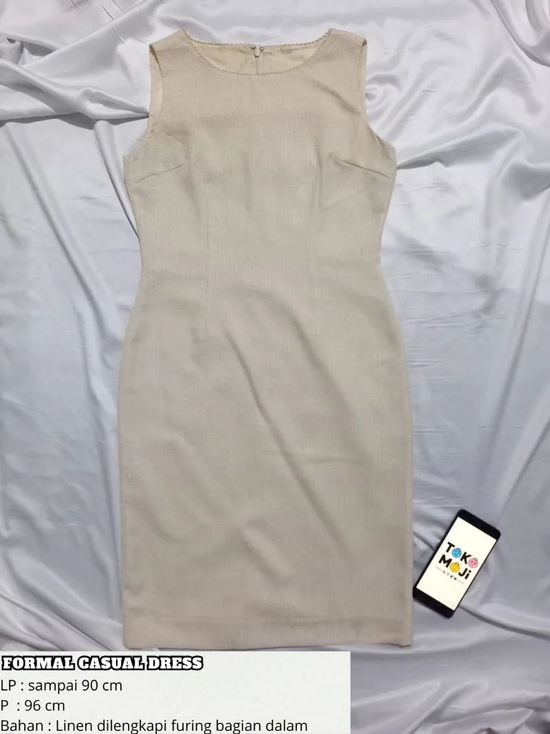 Dress Formal Midi Tanpa Lengan Warna Cream Elegan photo 1