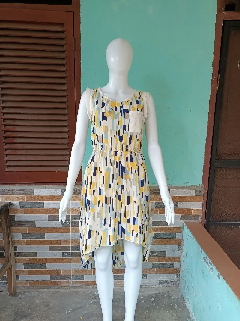 DRESS KUTUNGAN MOTIF ABSTRAK MEWAH photo 1