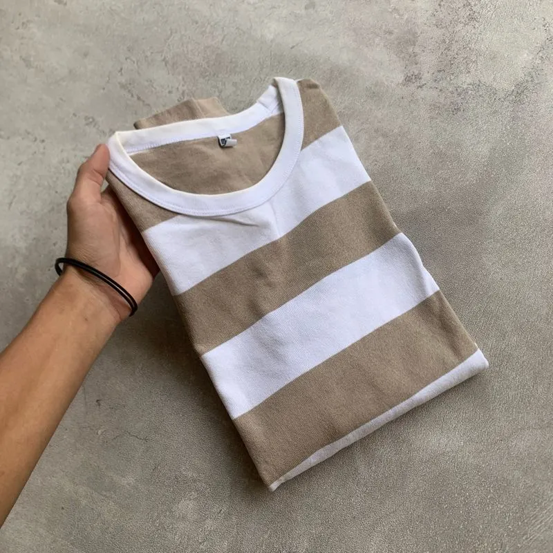 Uniqlo Streetwear T-shirt Pria white tan photo 1