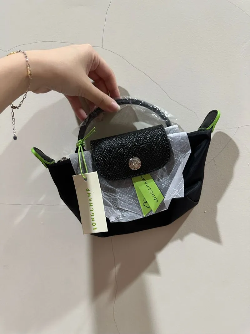 Longchamp Mini Pouch in Black Green Series photo 1