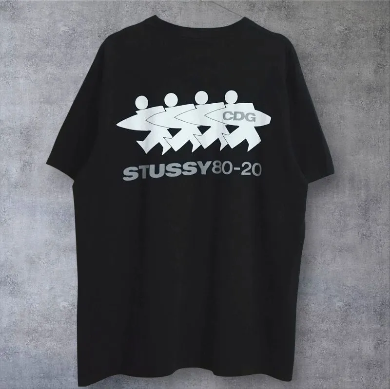 STUSSY SURFMAN TEE X COMME DE GARCONS photo 1
