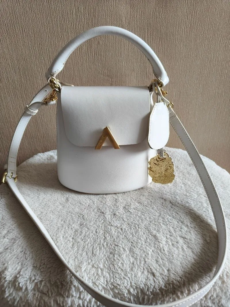 Esemble bell shoulder bag in white photo 1