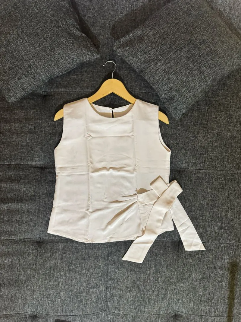 White Sleeveless top photo 1