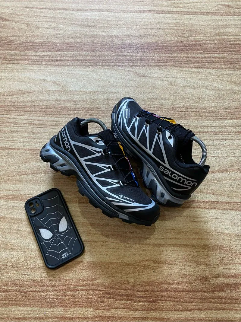 Salomon Streetwear Sportswear Sneakers Pria silver black photo 1
