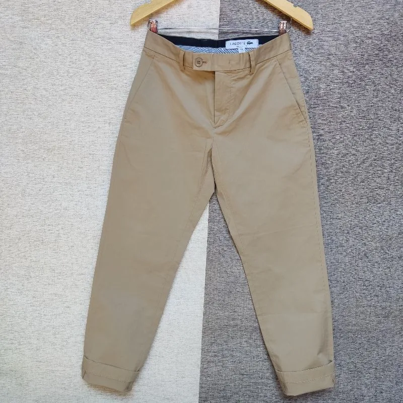 Celana Panjang Chinos LACOSTE colour Dark Cream Size 32cm photo 1
