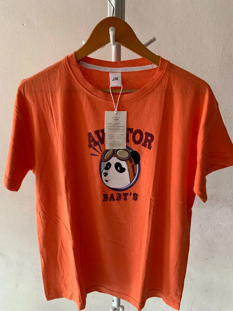 kaos import kartun orange photo 1