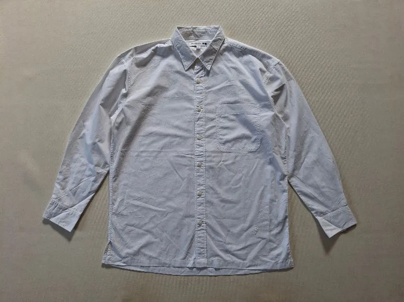 KEMEJA PUTIH UNIQLO X JW ANDERSON ORIGINAL 100% photo 1