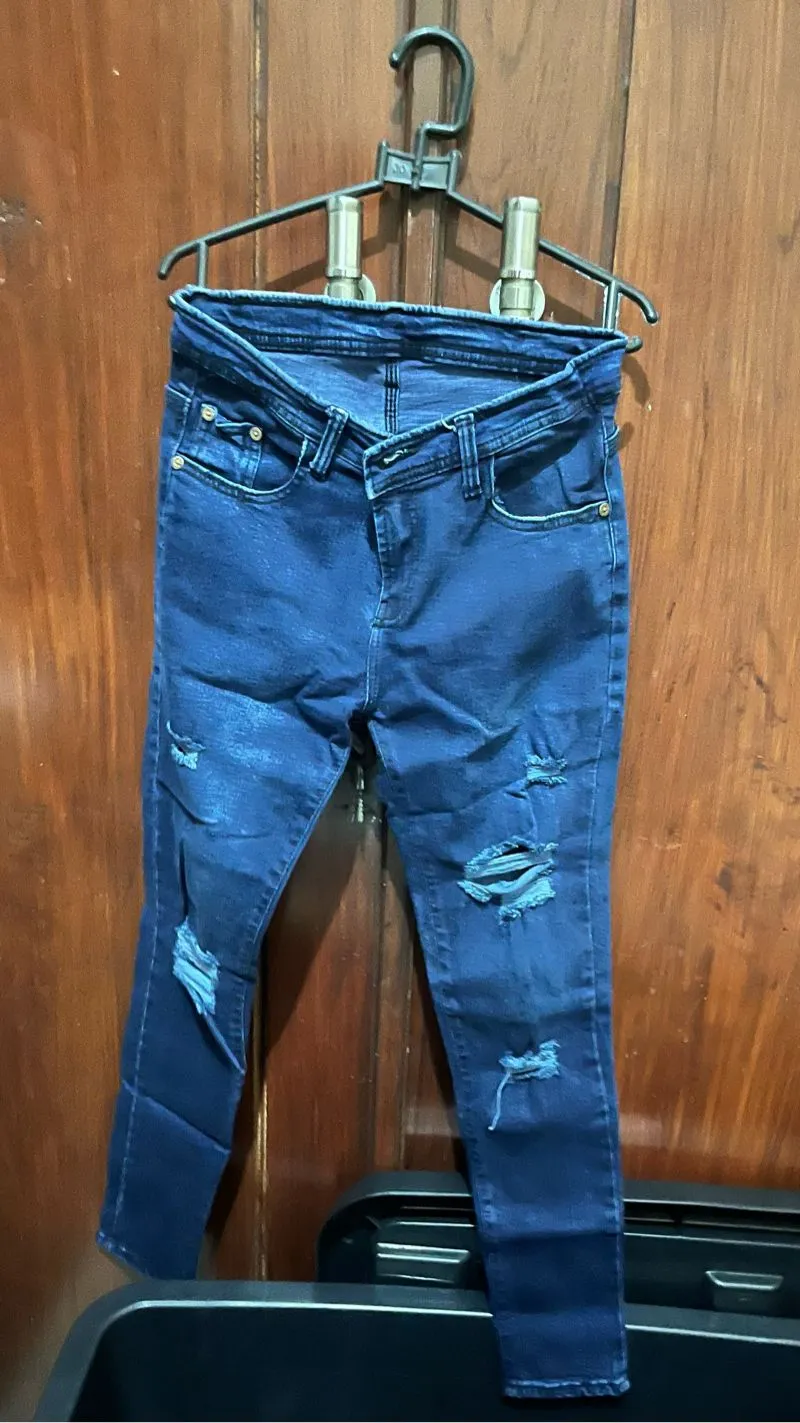ripped navy jeans photo 1