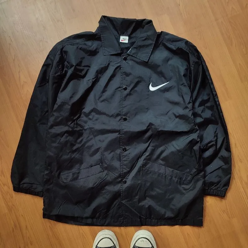 Vintage Nike Logo Coach Windbreaker  photo 1