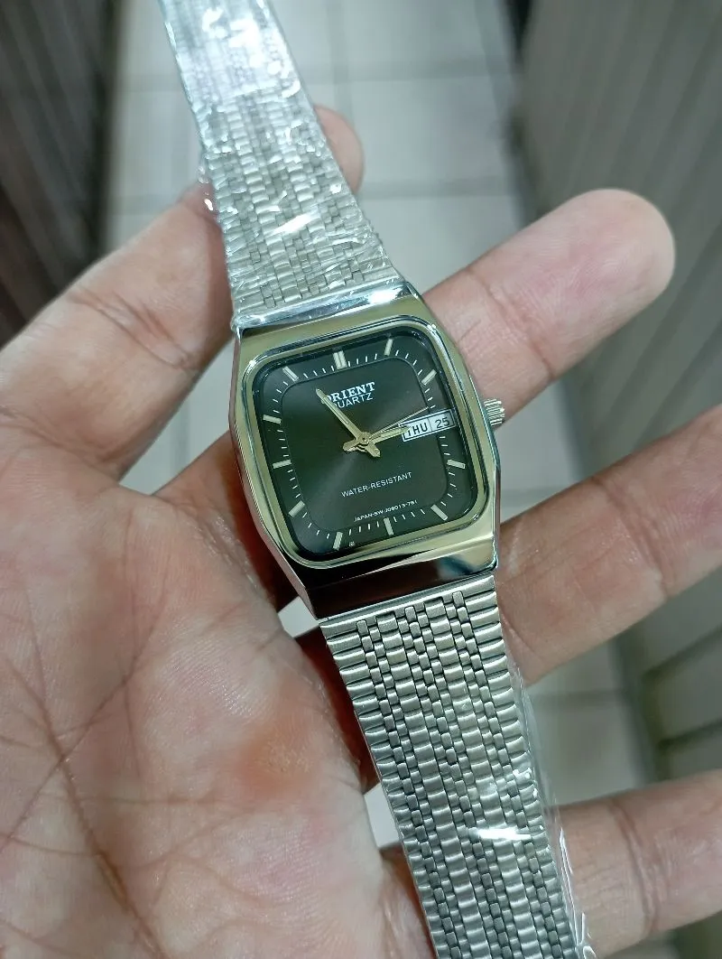 Jam tangan Orient quartz silver stenlis steel klasik photo 1