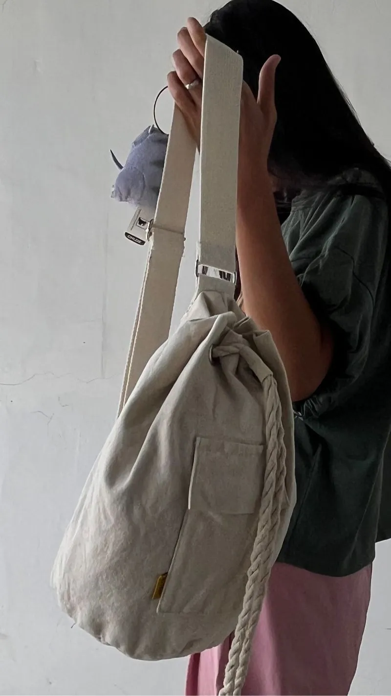 Cross Body Tas Serut Tabung Kanvas photo 1