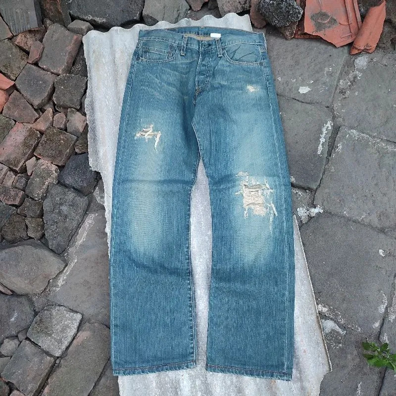Levi's 501 Blue Jeans Ripped photo 1