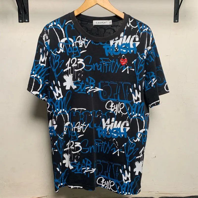 Comme Des Garcons CDGPLAY AOP TSHIRT photo 1