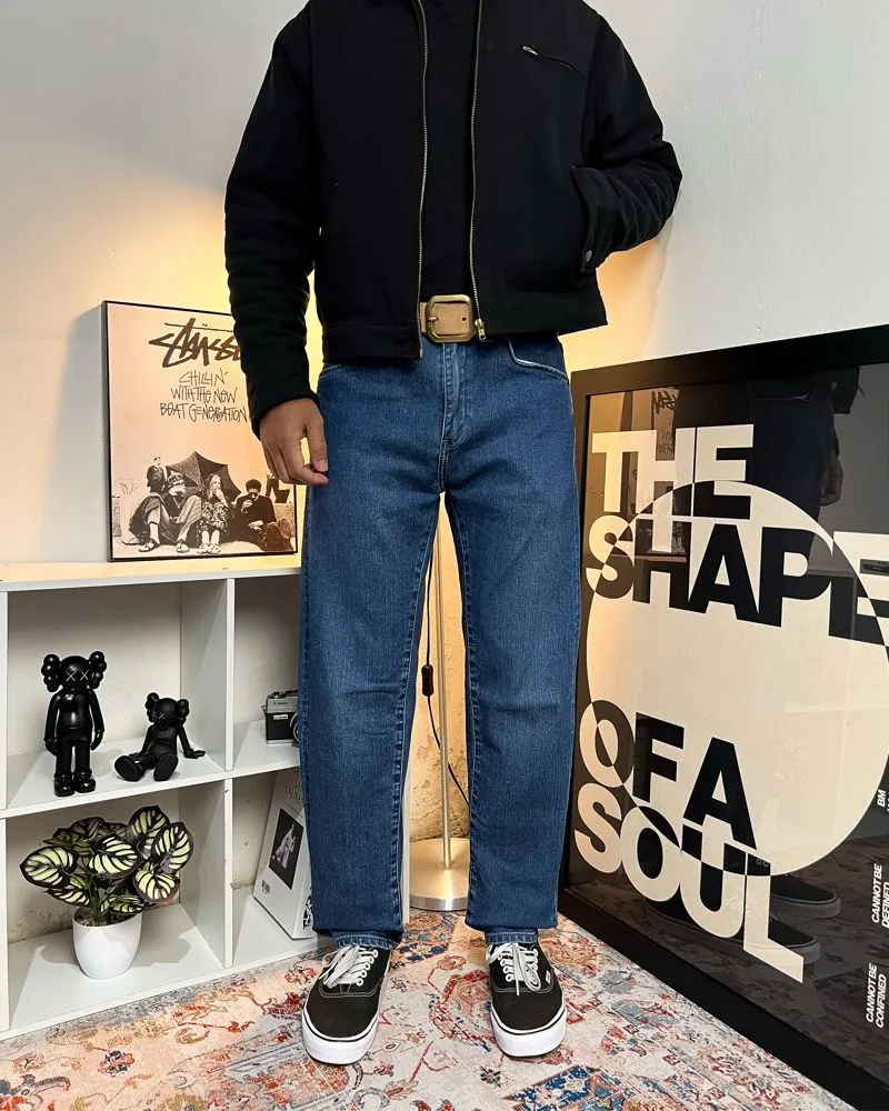 Uniqlo Jeans Reguler Tapered Fabric Miracle Air photo 1
