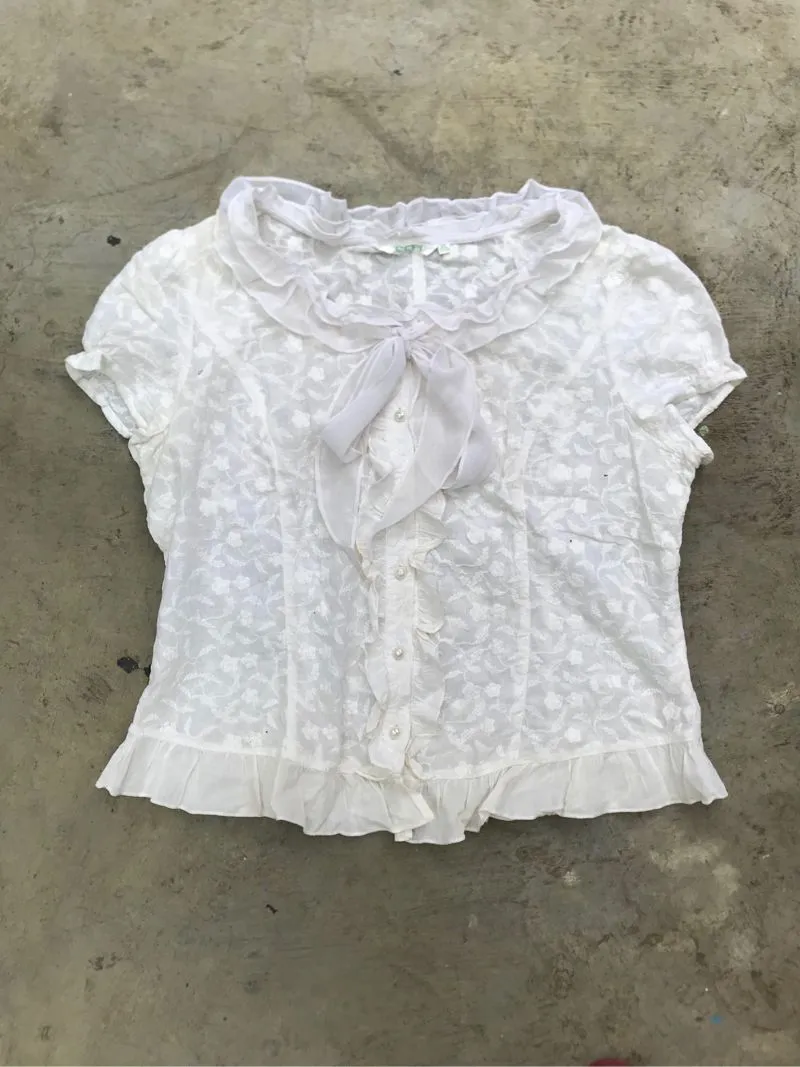 puff sleeve ribbon top photo 1