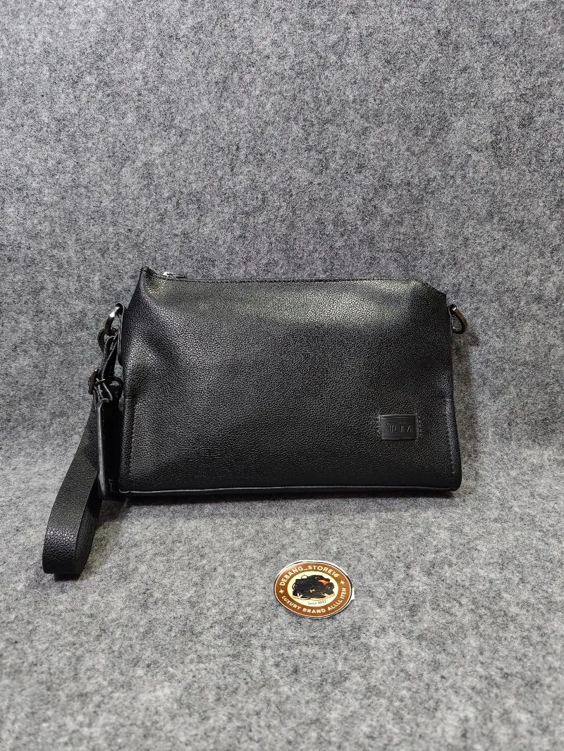 Tas selempang Tumi Leather photo 1