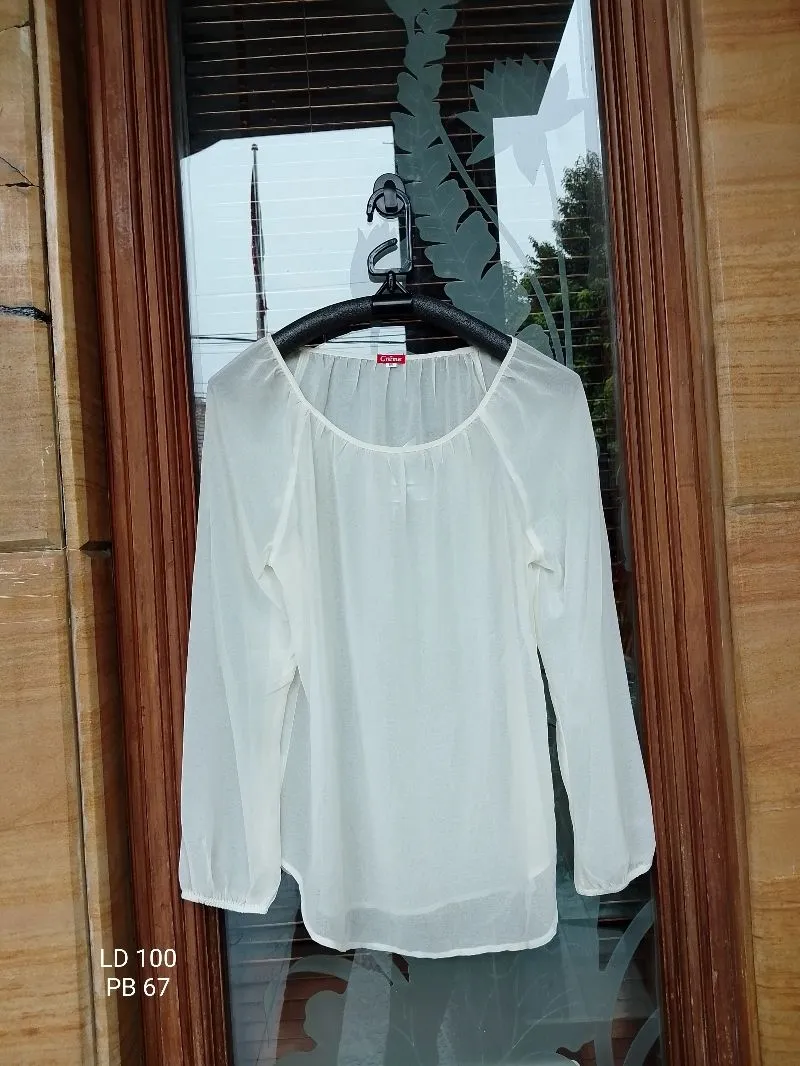 Blouse wanita by "creme" photo 1