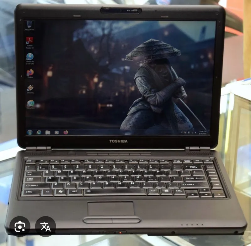 Laptop Toshiba L310 Versi Original photo 1