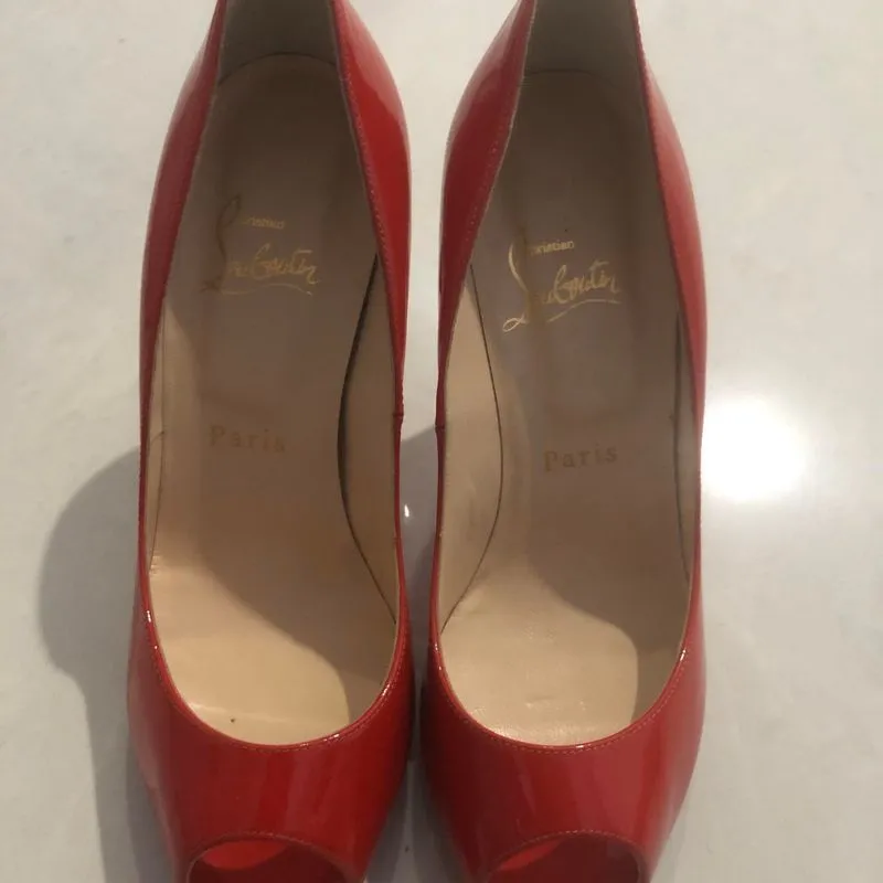 Christian Louboutin red pump photo 1