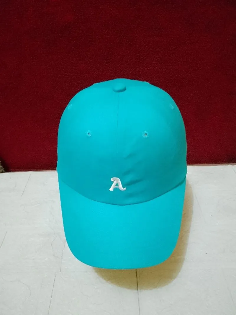 Topi Caps Logo A photo 1