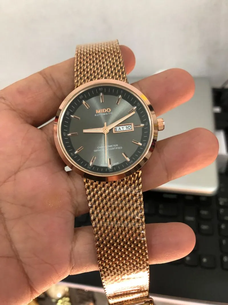 Jam tangan pria quartz mido rosegold elegan photo 1