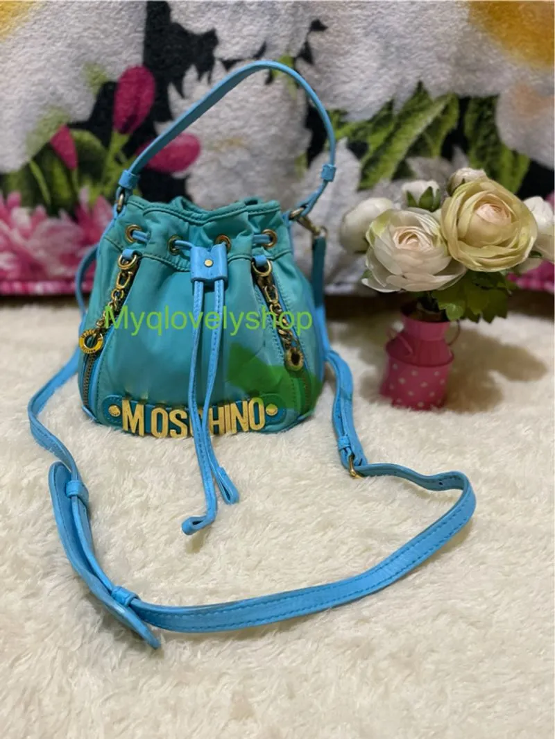 Preloved moschino serut nilon mix kulit photo 1