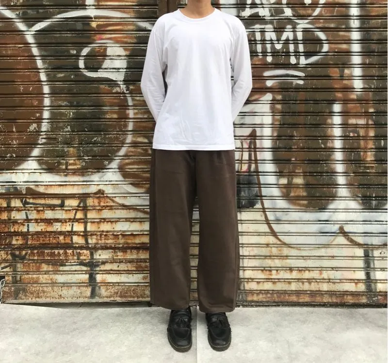 CHINO PANTS BROWN - UNIQLO U photo 1