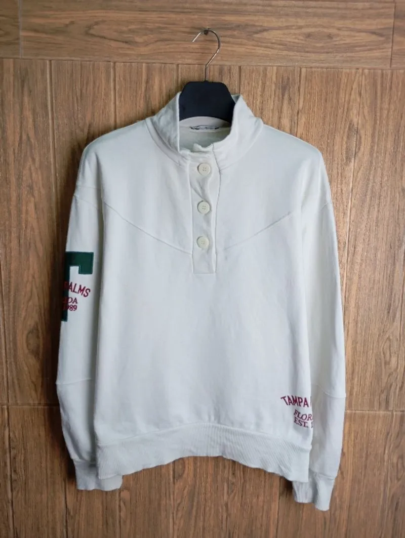 HALF BUTTON ZARA photo 1