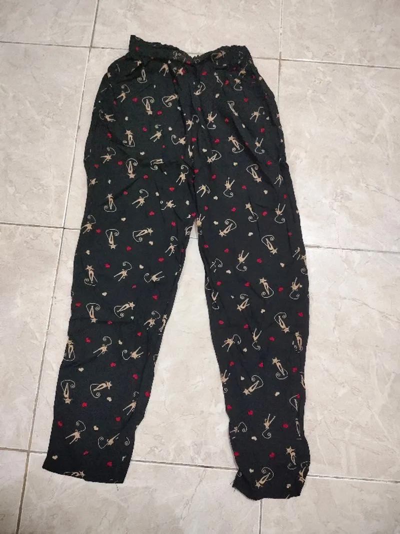 Celana panjang cewek bahan lembut corak hitam motif photo 1