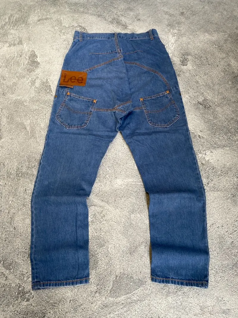 ISSEY MIYAKE MERCIBEAUCOP X LEE 3D CUT SARROUEL DENIM PANTS photo 1