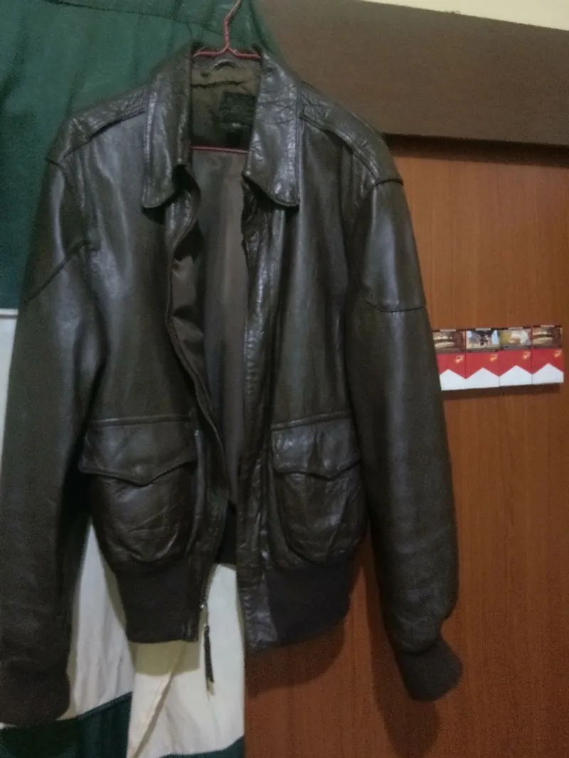 dark brown leather jacket. photo 1