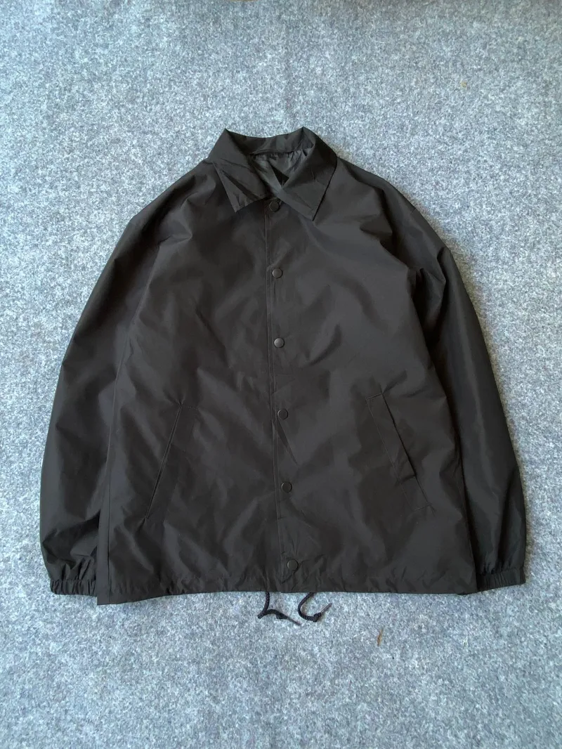 Uniqlo Casual Windbreaker Pria black photo 1