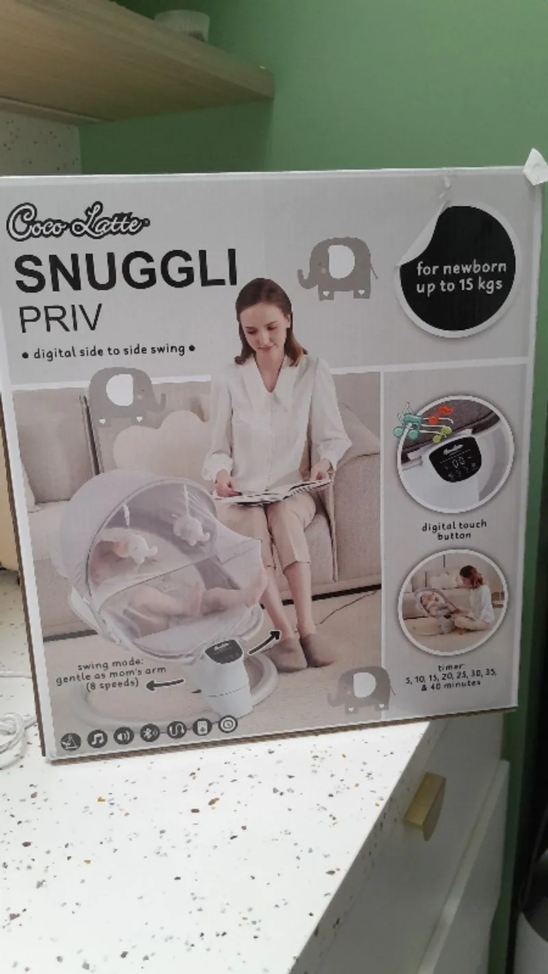 Snuggli baby photo 1