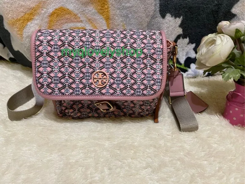 Preloved sling bag nilon Tory Burch  photo 1